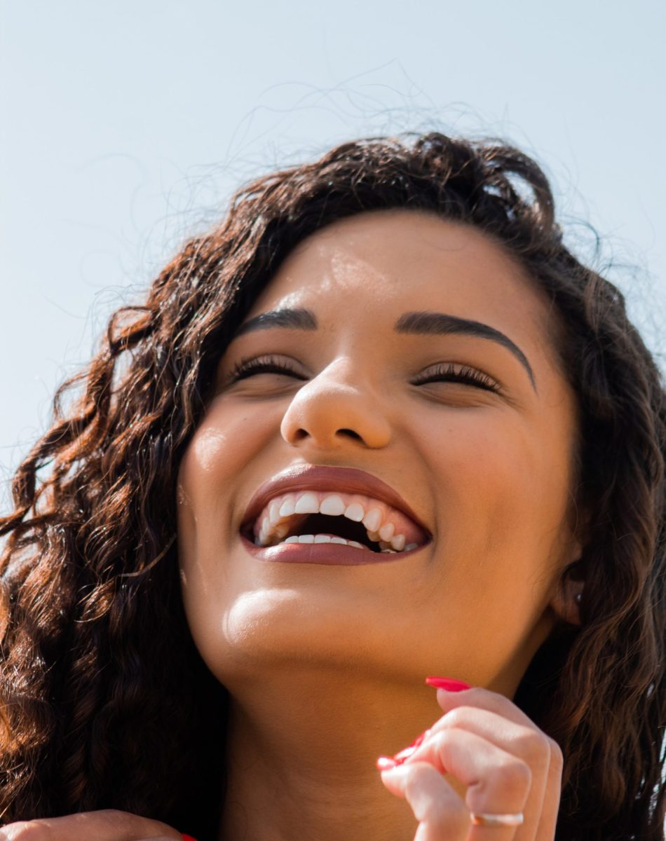 Hispanic woman laughing